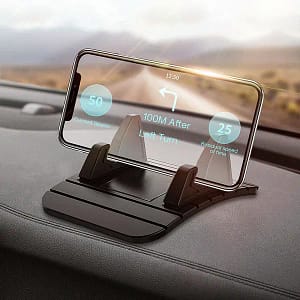 Rotating Air Vent Car Phone Holder securely holding a smartphone in a car.