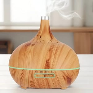 Essential oil diffuser with 7 LED lights, 550ML capacity, ultra-quiet operation, and waterless auto-off for aromatherapy and humidification.